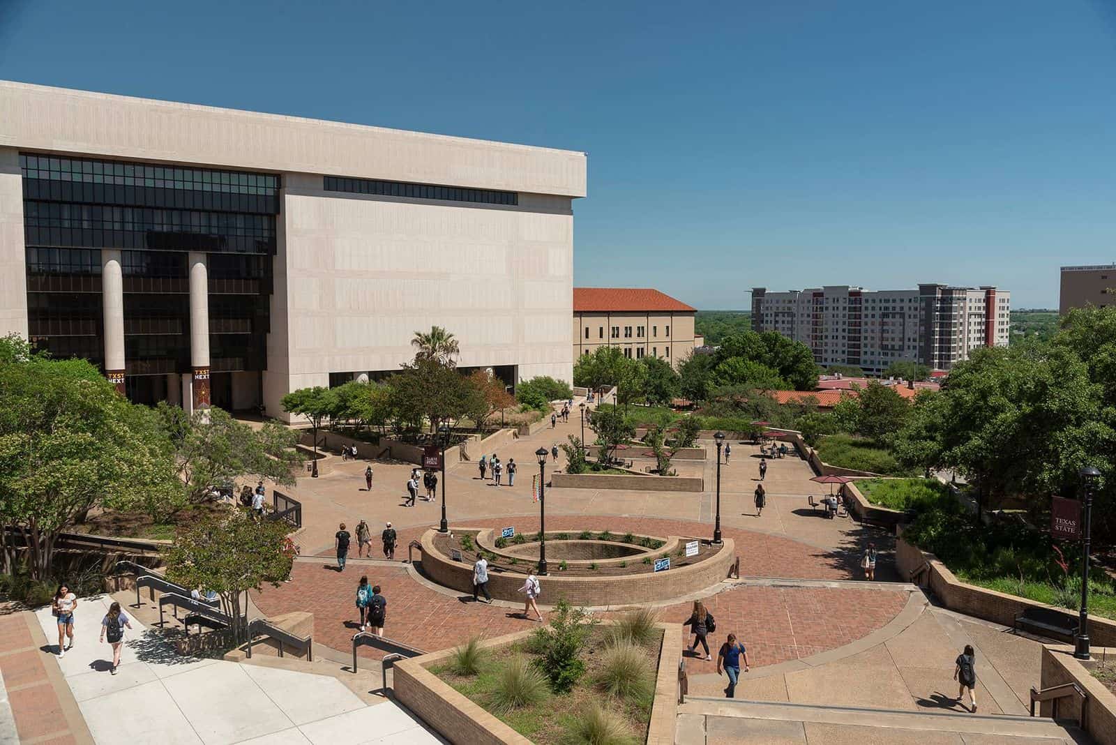 Students crossing the central campus quad