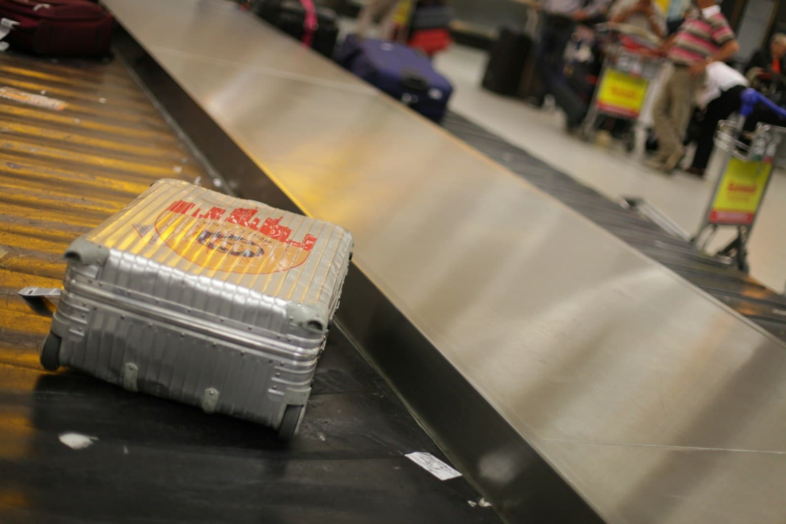 gray hardside luggage — Photo by Dimitri Karastelev on Unsplash