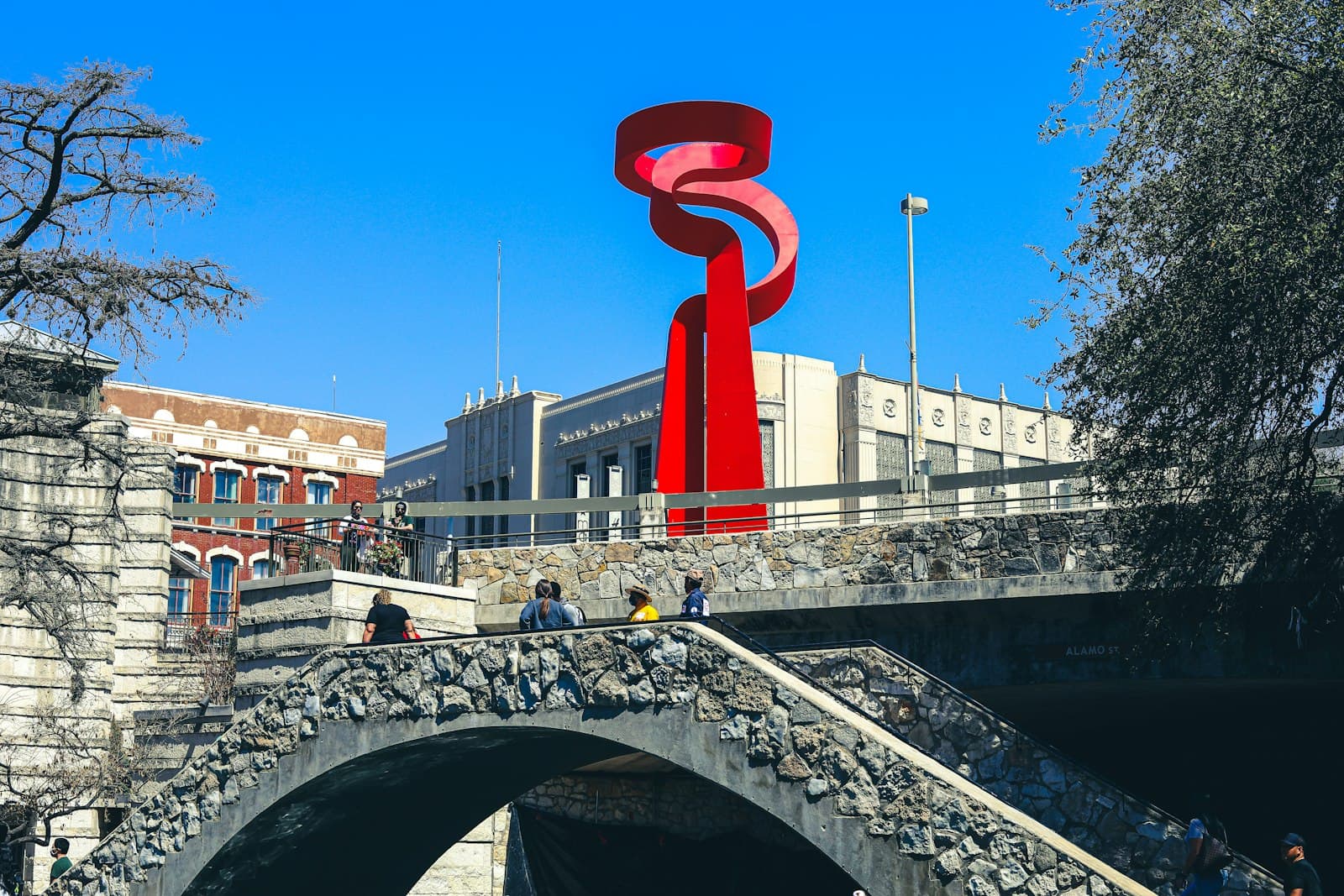 people walking on gray concrete bridge during daytime — Photo by Carl Hunley Jr on Unsplash